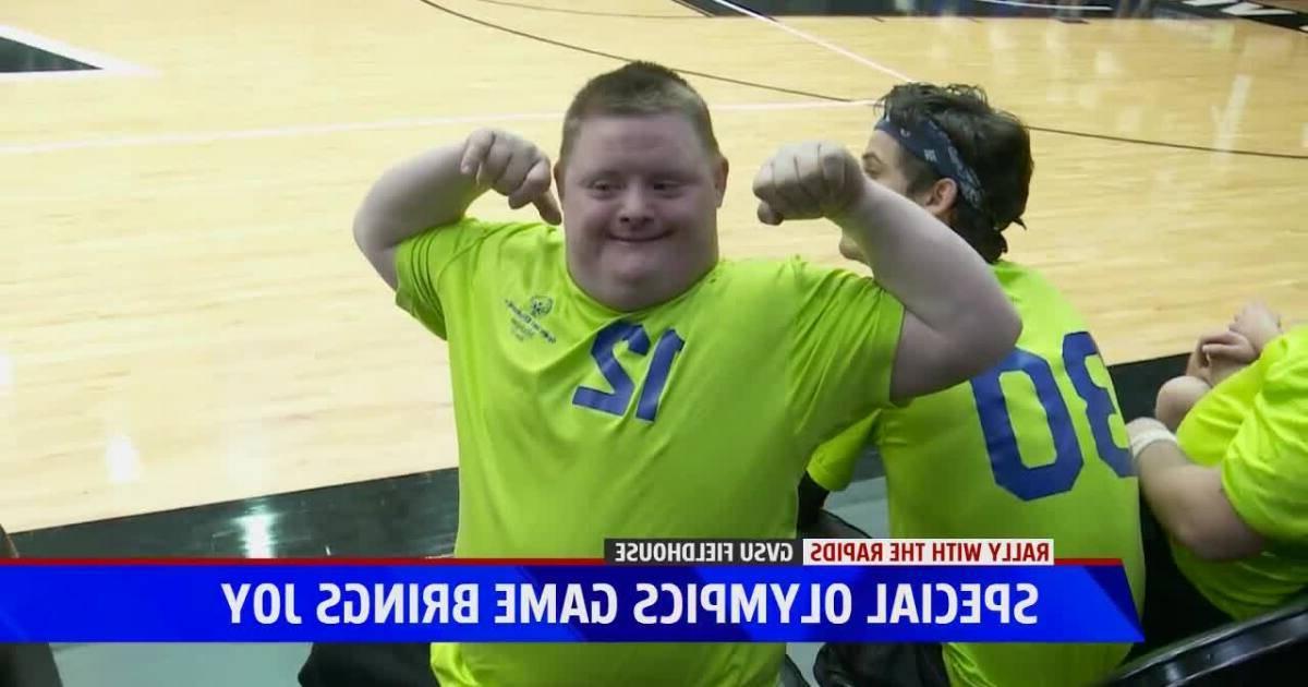 Special Olympian posing, link to Fox17 News Article